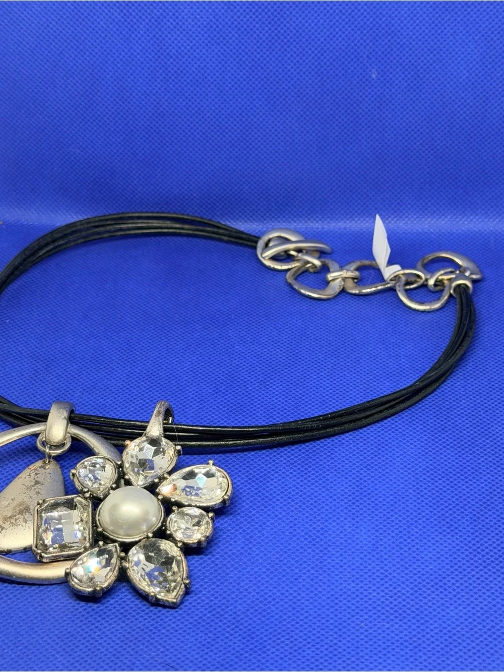 Silver Flower Pendant Necklace with Black Cord and Clear Accents